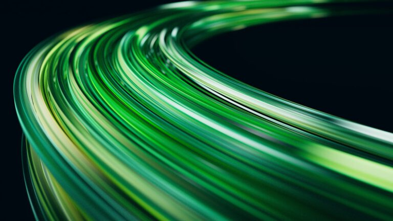 Abstract flowing green lines on black background